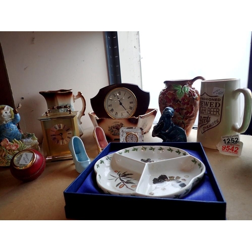 1252 - Quantity of mixed ceramics and clocks including a boots brand ginger beer jug. Not available for in-... 