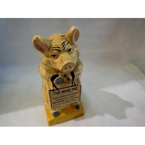 1253 - Cast iron The Wise Pig money box. H:15cm. UK P&P Group 1 (£16+VAT for the first lot and £2+VAT for s... 