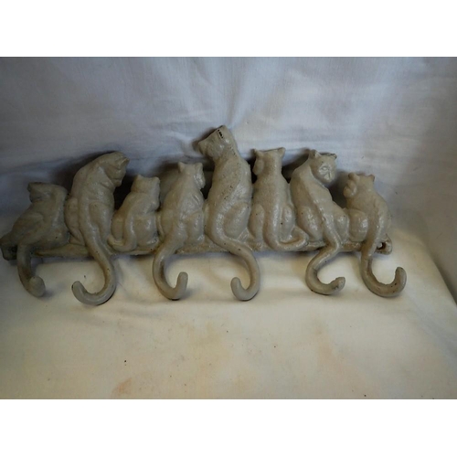 1264 - Cast iron cat tail coat hanger, L: 36 cm. UK P&P Group 2 (£20+VAT for the first lot and £4+VAT for s... 