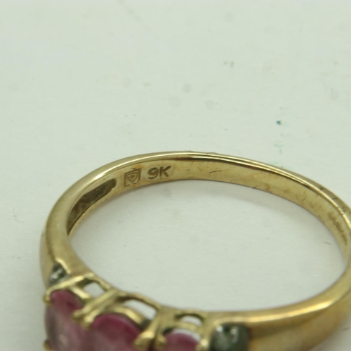 42 - 9ct gold ring, set with three pink stones and white stones to the shoulders, size P, 2.0g. UK P&P Gr... 