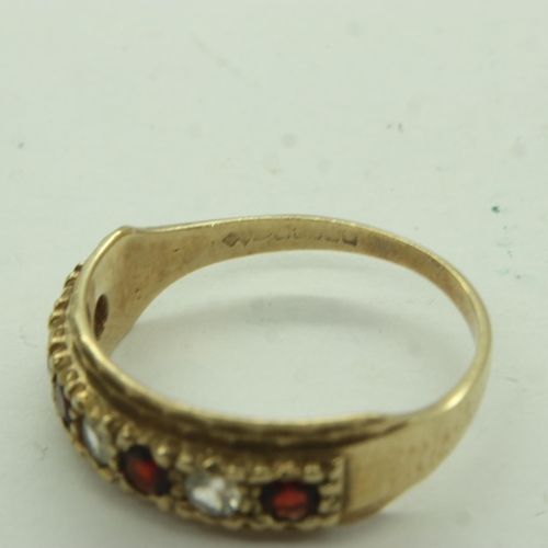 43 - 9ct gold half eternity ring set with garnets and cubic zirconia, size K, 1.7g. UK P&P Group 0 (£6+VA... 