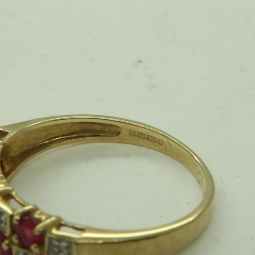 46 - 9ct gold ring, set with diamond and red semi precious stones, size P, 2.3g. UK P&P Group 0 (£6+VAT f... 