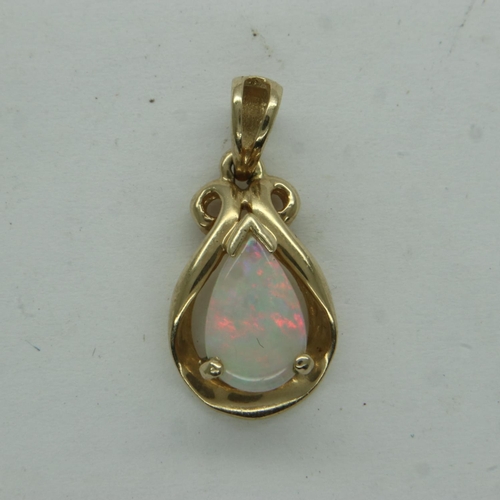 5 - 10ct gold pendant set with a teardrop opal, drop length 17 mm, 0.8g. UK P&P Group 0 (£6+VAT for the ... 