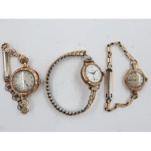 74 - Collection of three ladies 9ct gold wristwatches, one on an expanding gold plated bracelet, total 48... 