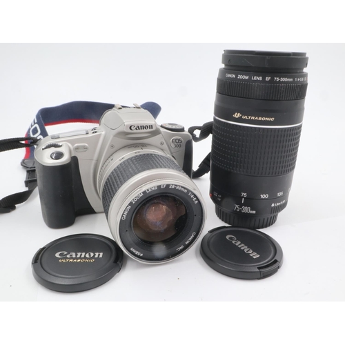 97A - Canon E300 camera with Canon 58m and 75-300 zoom lense. UK P&P Group 2 (£20+VAT for the first lot an... 