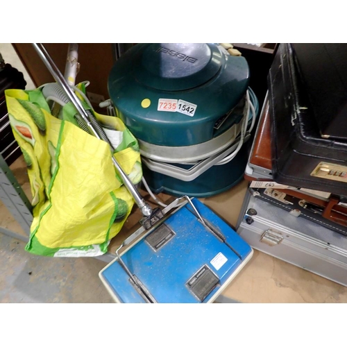 1542 - Bissel carpet washer with attachments and shampoo and a carpet sweeper. Not available for in-house P... 