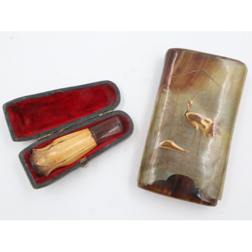 111 - Oriental carved horn cigar case, together with a cased cigarette holder (2). UK P&P Group 1 (£16+VAT... 