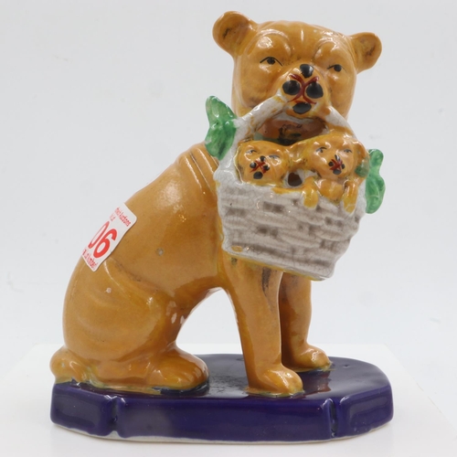 175 - Oriental dog with basket of pups, no cracks or chips, H: 15 cm. UK P&P Group 1 (£16+VAT for the firs... 