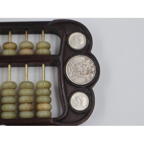 248 - Early 20th century hardwood and Jade abacus, inset with silver coins, L: 42 cm. UK P&P Group 2 (£20+... 