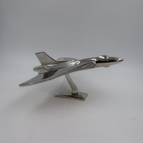 304 - Large chrome Vulcan bomber on stand, wingspan 42 cm. UK P&P Group 3 (£30+VAT for the first lot and £... 