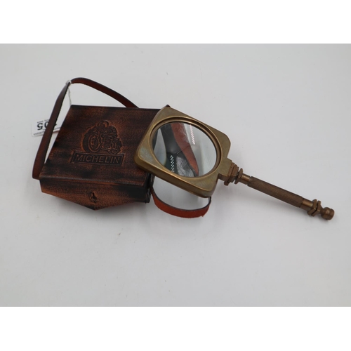 305 - Brass Michelin magnifying glass and leather case. UK P&P Group 2 (£20+VAT for the first lot and £4+V... 