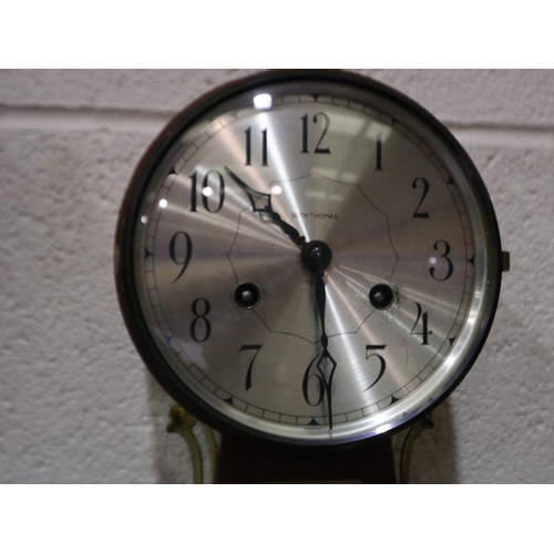 312 - Seth Thomas oak and brass wall clock, with eagle finial, H: 74 cm. Not available for in-house P&P