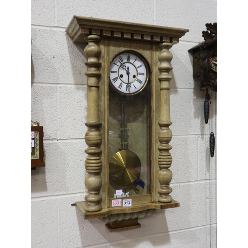 313 - Limed oak cased wall clock, pendulum and key present, 82cm H. Not available for in-house P&P