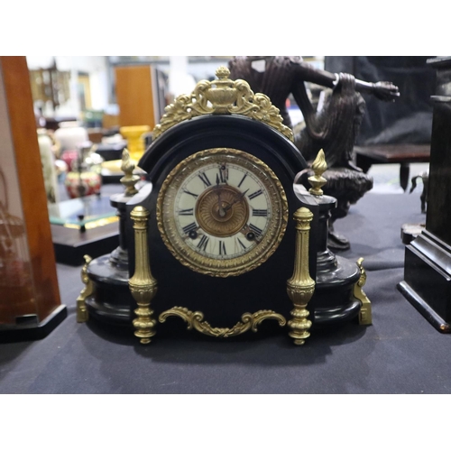 317 - American 19th century Ansonia mantel clock. with a domed metal case with gilt attachments, chiming o... 