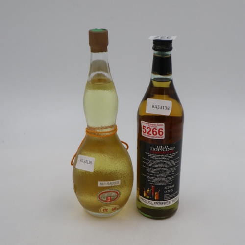 327 - 70cl bottle of Ron Oscuro Old Hopking Caribbean dark rum and a 72cl bottle of Sake. UK P&P Group 3 (... 