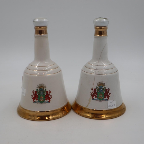 331 - Two 75cl Bells decanters for the 60th birthday of the Queen and Prince Andrew's wedding. UK P&P Grou... 