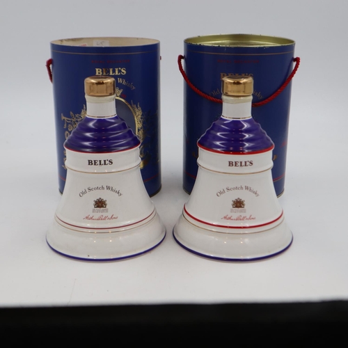 336 - Two 75cl Bells whisky decanters for the births of Princesses Beatrice and Eugenie, with sleeves, one... 