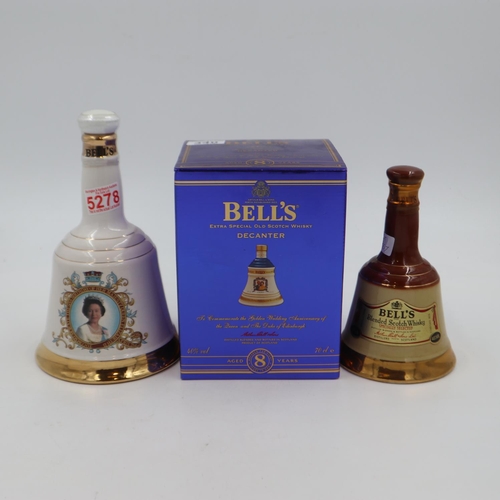 340 - Three Bells Whisky decanters, 75cl Queen's 60th birthday, 70cl Queen's Golden wedding boxed and a 35... 