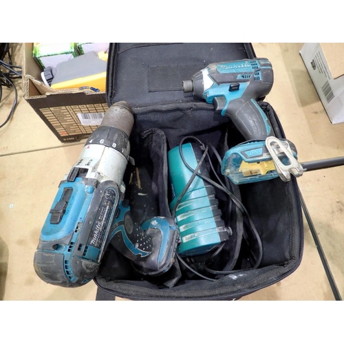 1732 - Two drills and a charger. Large container full of stud wall off cuts for projectors or firewood. All... 