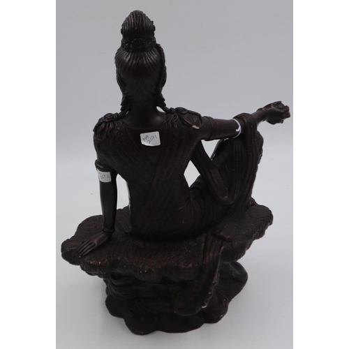 250 - Large bronzed figure of an Eastern deity sitting on a rock holding a ball in her right hand. Not ava... 