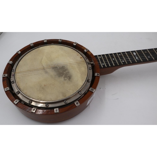 277 - Five string banjo, trainee luthier made. Leather bound case included. No makers marks and signs of b... 