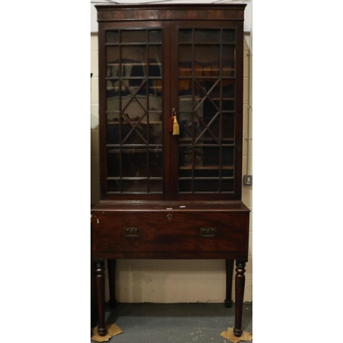 2069 - A monumental 19th century secretaire, the single fitted drawer sits on four turned supports and bene... 