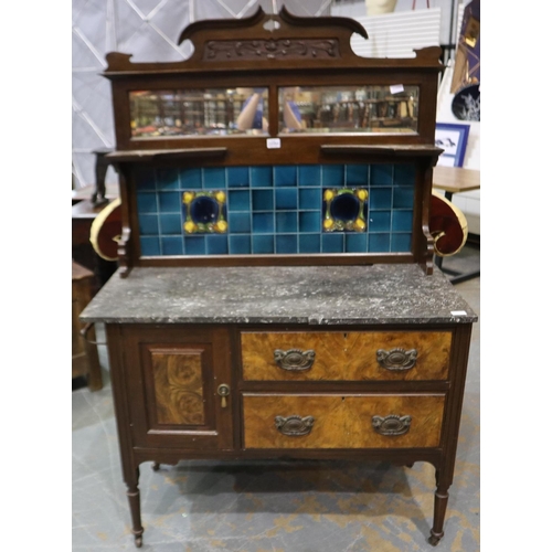 2090 - An Art Nouveau period mahogany wash stand, with marble top, tiled and mirrored superstructure with a... 