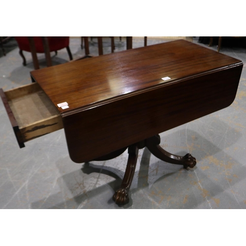 2108 - A 19th century table, having two drop leaves and single drawer, raised on a carved quadripartite sup... 