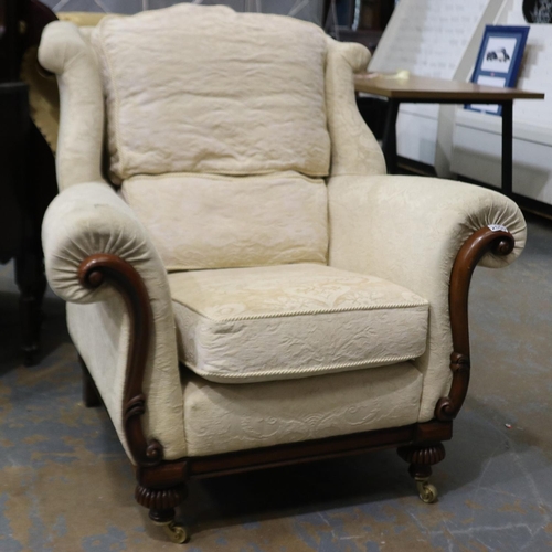 2050 - Wade Furniture: a 20th century cream upholstered bedroom chair raised on brass castors. Not availabl... 