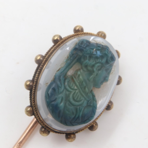 10 - Antique 9ct gold and carved hardstone cameo stick pin, L: 80 mm, 5.2g. UK P&P Group 0 (£6+VAT for th... 