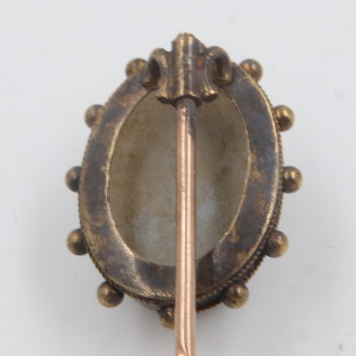 10 - Antique 9ct gold and carved hardstone cameo stick pin, L: 80 mm, 5.2g. UK P&P Group 0 (£6+VAT for th... 