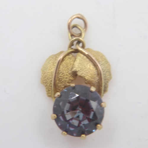 25 - Unmarked 14ct gold and amethyst solitaire leaf pattern pendant, 1.3g. UK P&P Group 0 (£6+VAT for the... 