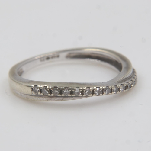 29 - 9ct gold crossover ring set with diamonds, size J, 1.7g. UK P&P Group 0 (£6+VAT for the first lot an... 