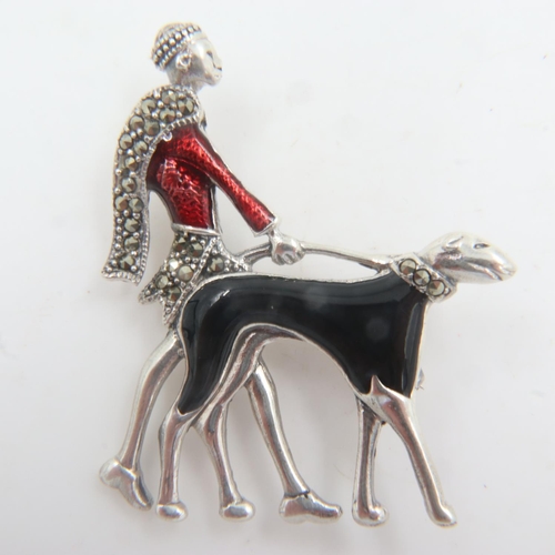 41 - Unmarked white metal Art Deco design enamelled brooch, lady walking a dog, H: 40 mm. UK P&P Group 0 ... 