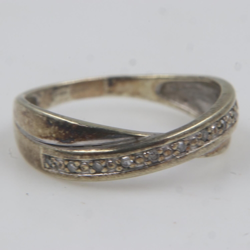 44 - 9ct gold crossover ring set with diamonds, size K, 2.1g. UK P&P Group 0 (£6+VAT for the first lot an... 