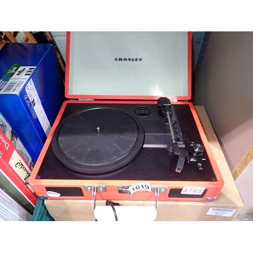 1019 - Boxed Crosley briefcase turntable, with power supply and accessories, working. Not available for in-... 