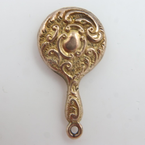 58 - Antique unmarked gold miniature hand mirror charm, 1.4g. UK P&P Group 0 (£6+VAT for the first lot an... 