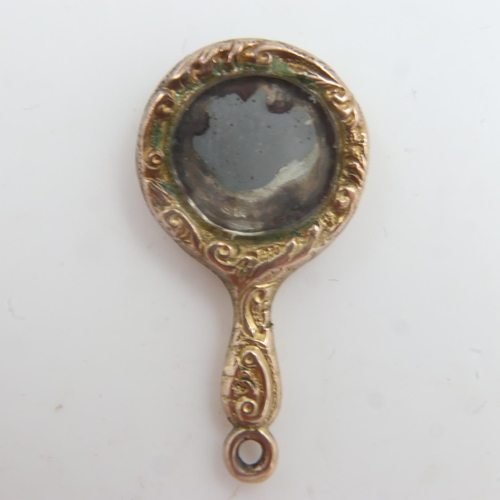 58 - Antique unmarked gold miniature hand mirror charm, 1.4g. UK P&P Group 0 (£6+VAT for the first lot an... 