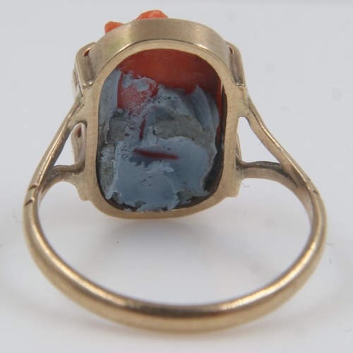 69 - 9ct gold carved coral panel set ring, size L/M (stone held with tack). UK P&P Group 0 (£6+VAT for th... 