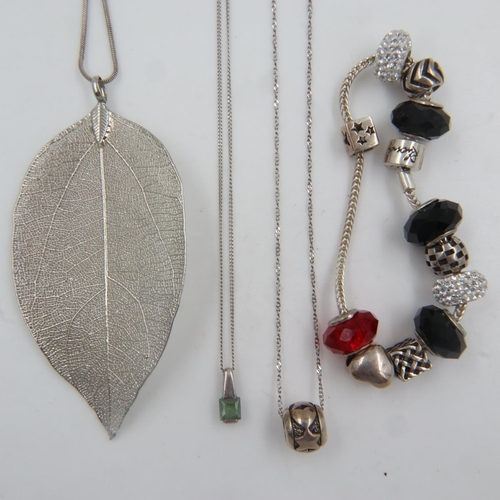 38 - Three 925 silver pendant necklaces and a 925 silver bracelet. UK P&P Group 1 (£16+VAT for the first ... 