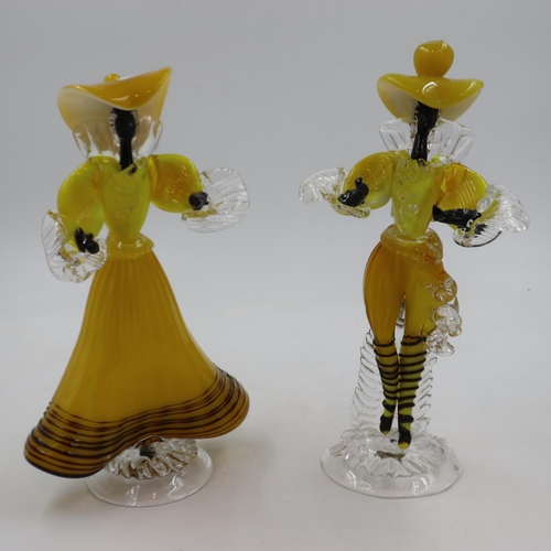 282 - Art glass figure of a dancer in yellow, clear and black glass, H: 32 cm. Not available for in-house ... 