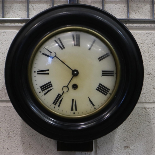 316 - A Victorian circular wall clock, with ebonised case, D: 39 cm, not working. Not available for in-hou... 