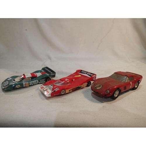 2041 - Three 1/24 scale slot cars, Ferrari 250 GT, and two Le Mans style cars with Parma Flexi 2 sidewinder... 