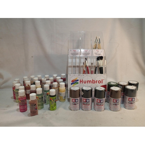 2045 - Eight Tamiya colour aerosols and twenty seven Deco Art acrylic paints and a selection of paintbrushe... 