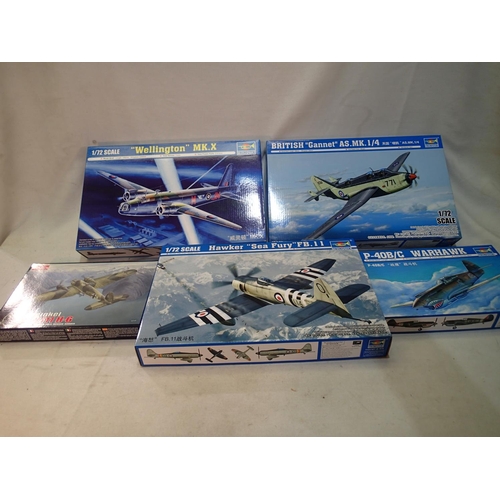 2065 - Four 1/72 scale aircraft kits, Trumpeter Wellington, Gannet, Warhawk and Sea Fury, and Roden Heinkel... 