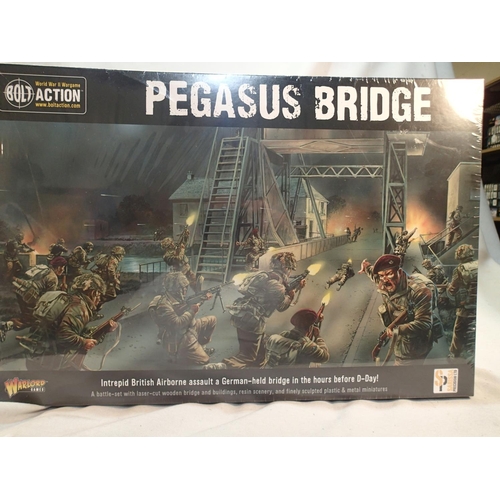 2101 - Bolt Action/Warlord Games Pegasus Bridge set, comprising bridge, scenery, plastic and metal figures,... 