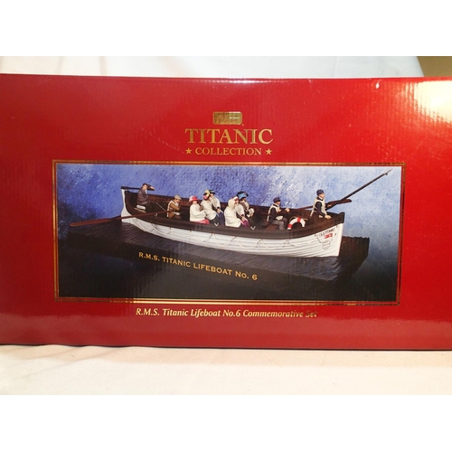 2112 - Britains 62001 Titanic lifeboat No. 6, commemorative set comprising life boat, ten figures and acces... 