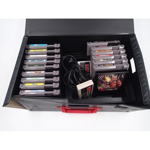 2176 - Official Nintendo carry case with two NES controllers and sixteen games to include Pirates by Palcom... 