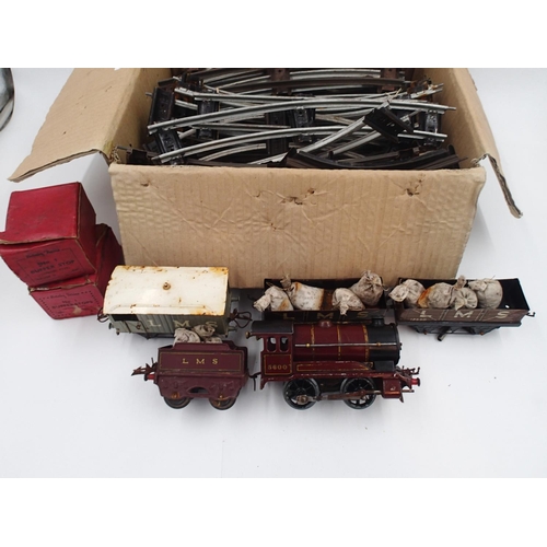 2179 - ***WITHDRAWN***Hornby O gauge, clockwork 0.4.0 locomotive and tender, LMS red, plus wagons, track et... 