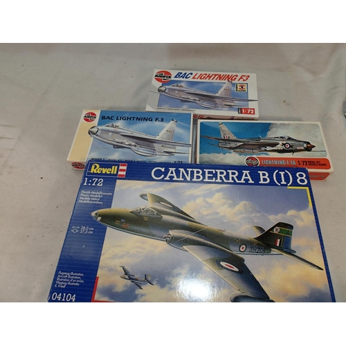 2355 - Four 1/72 scale aircraft kits, Revell Canberra and three Airfix Lightening, all appear complete, unc... 